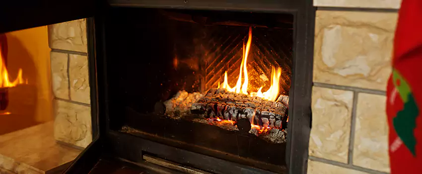 Commercial Prefabricated Fireplace Replacement in Saint-Charles, Quebec